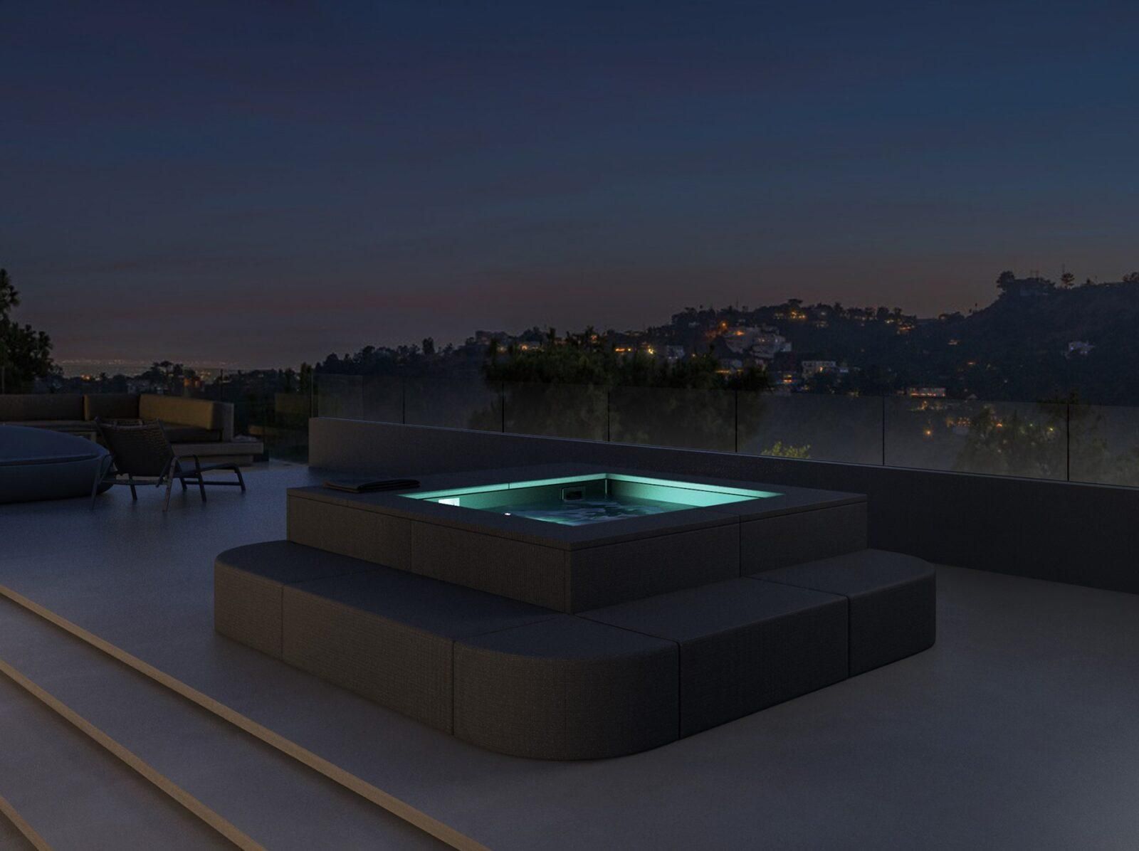 Jacuzzi sul tetto di notte, con luce blu-verde, che domina le luci della città.