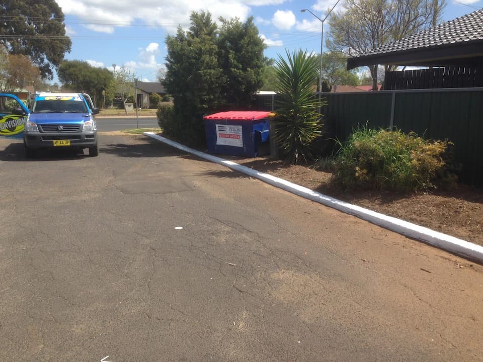 Truck Driving Up Driveway — Sign Writing in Dubbo, NSW