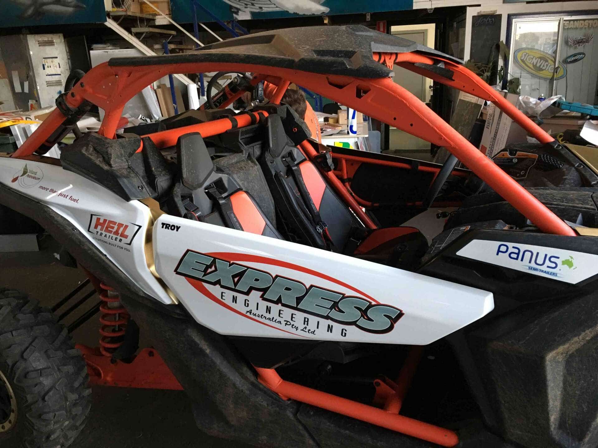 Orange Karts With Vehicle Signage — Sign Writing in Dubbo, NSW