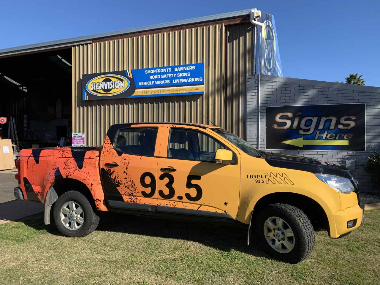 Ute With 93.5 Vehicle Wrap — Sign Writing in Dubbo, NSW