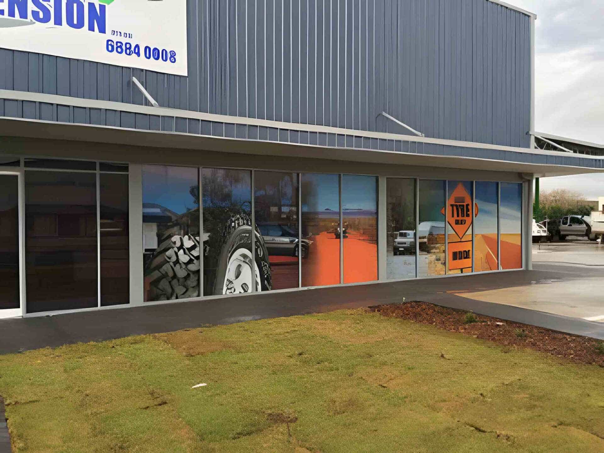 Shopfront With Glass Signage — Sign Writing in Dubbo, NSW