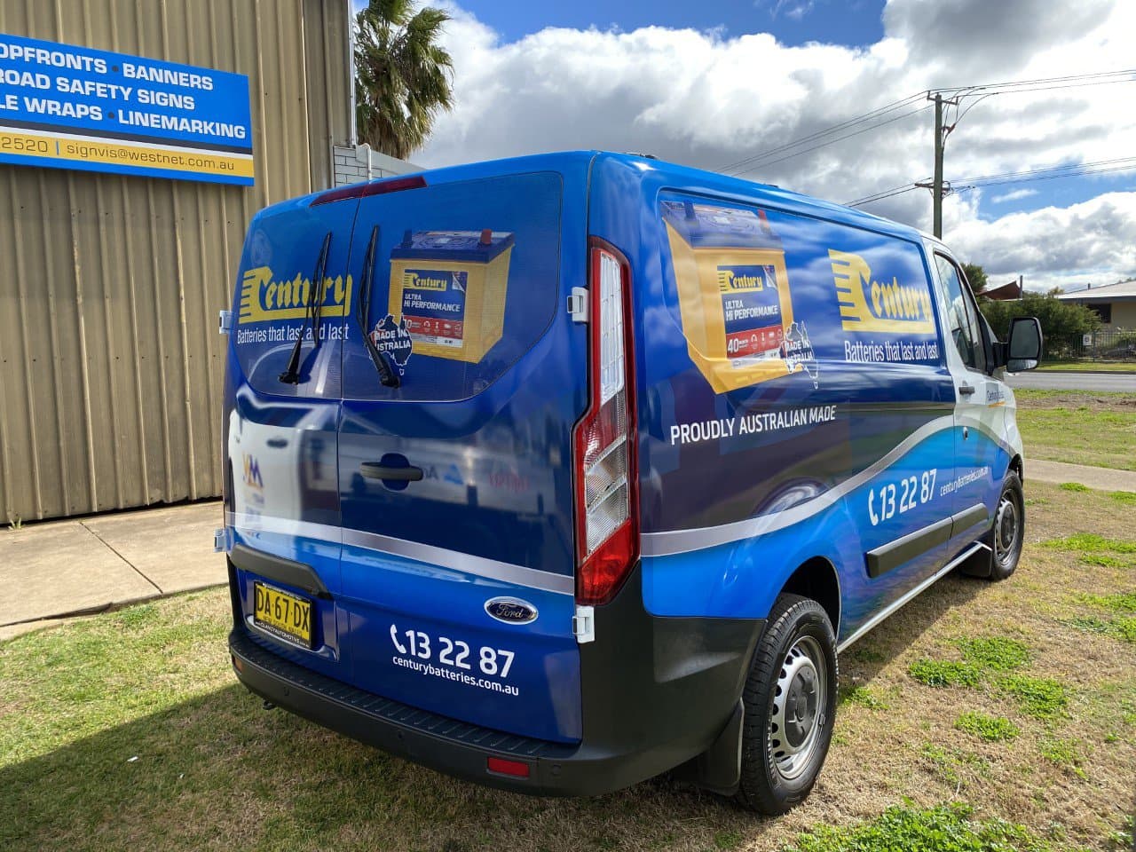 Blue Van With Sign Wrap — Sign Writing in Dubbo, NSW