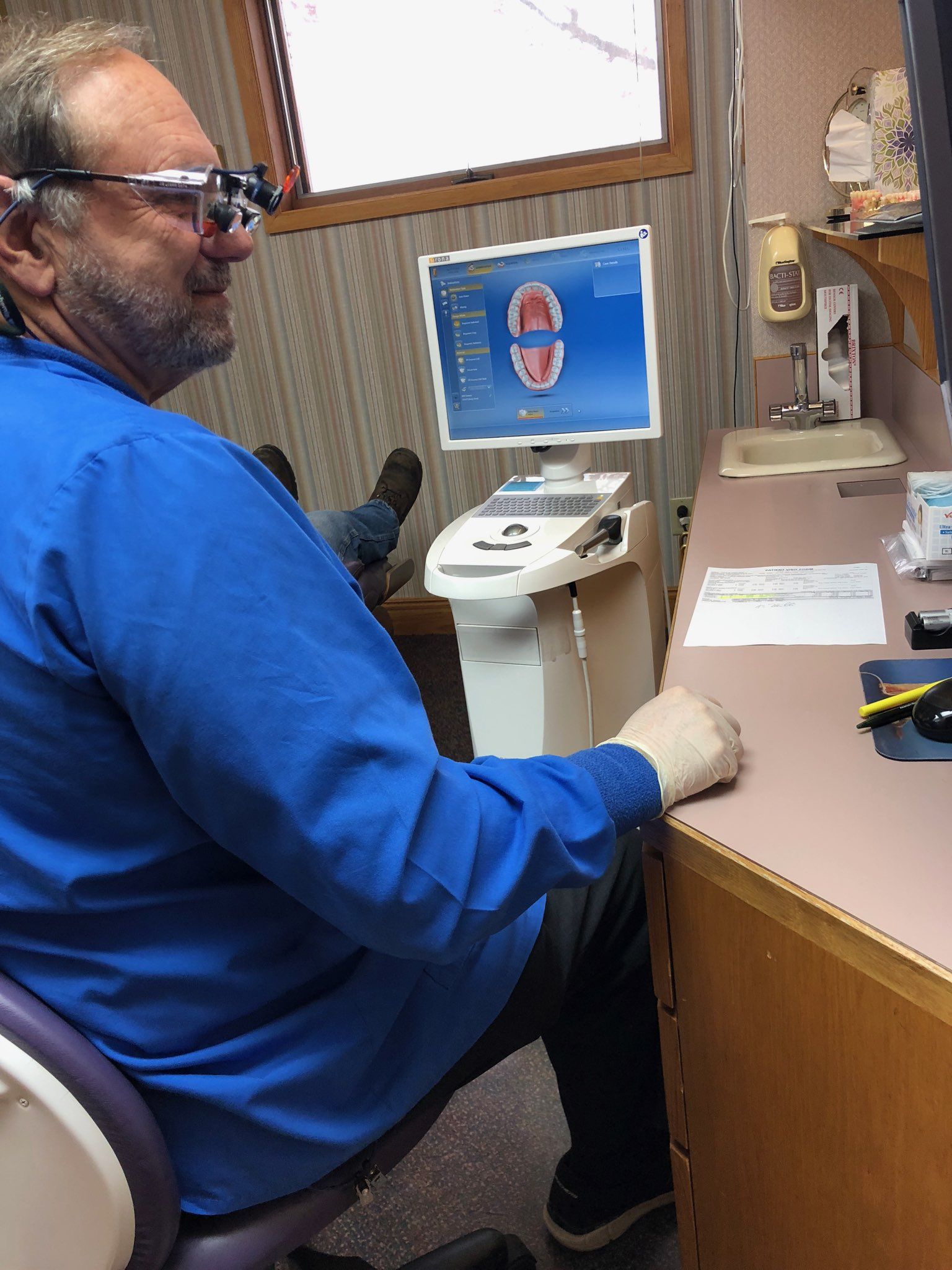 A professional working on dental crowns near Orono, ME