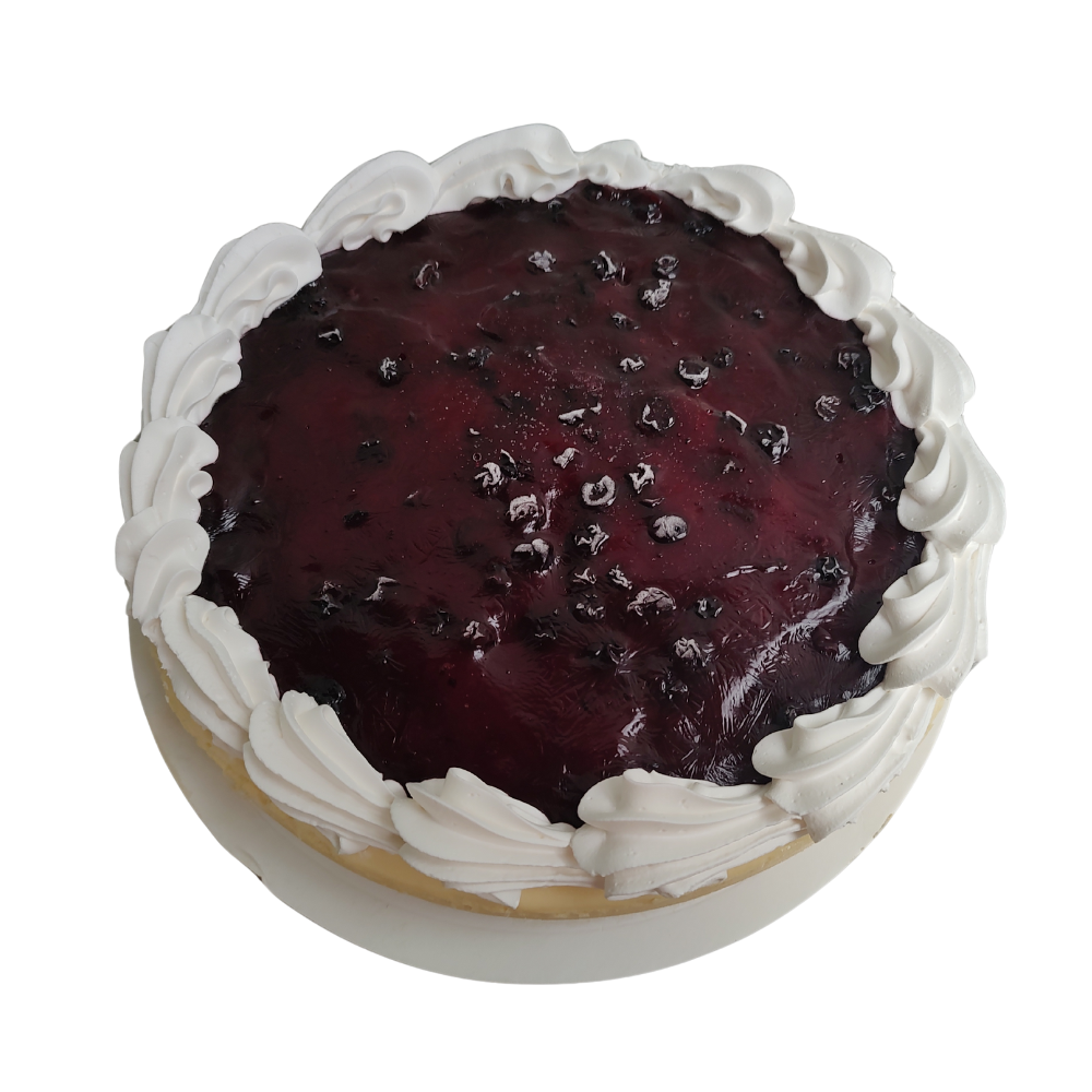 Tarta de queso y arándanos con borde de crema batida de Azúcar y Cacao