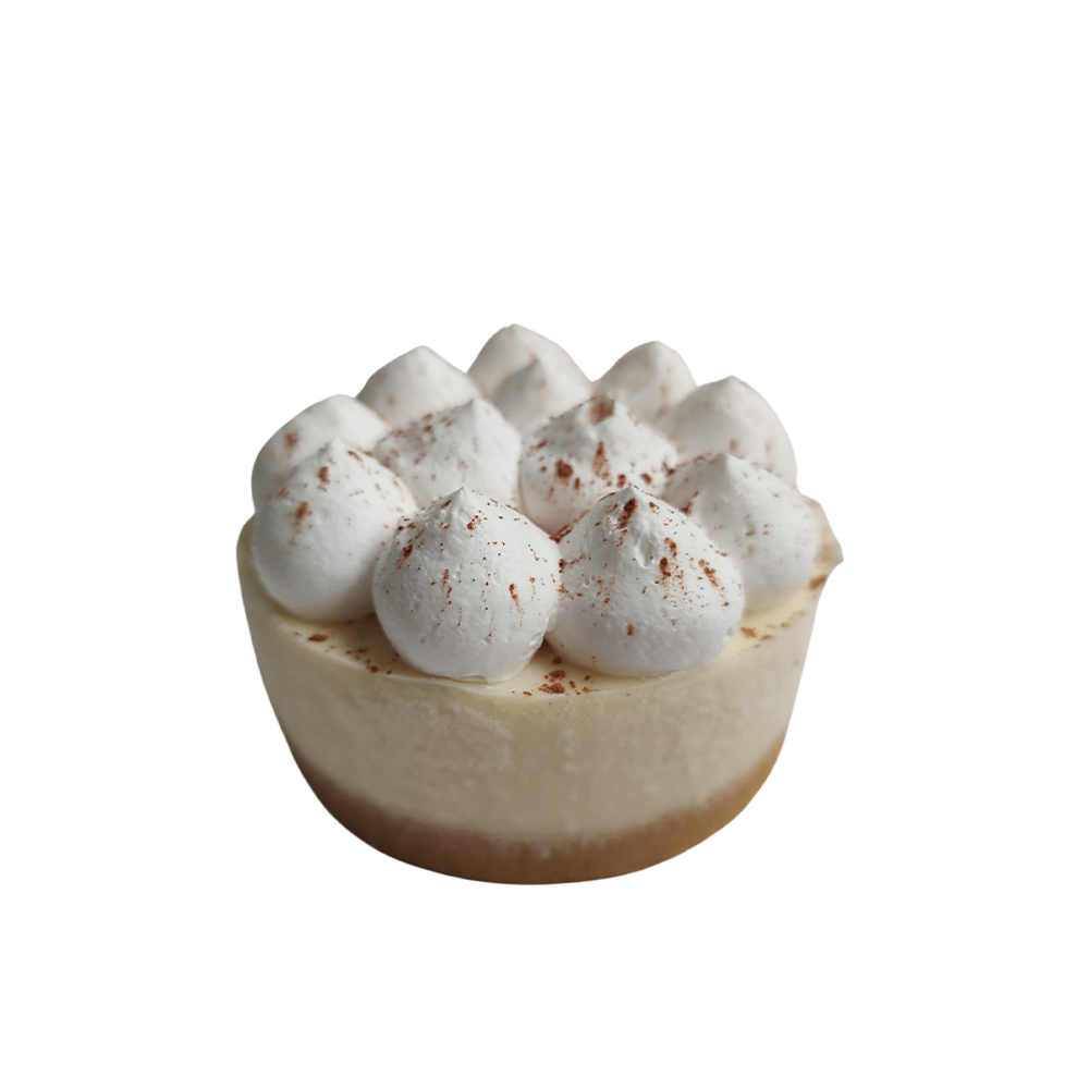 Mini tarta de queso con cobertura de merengue espolvoreada con cacao de Azúcar y Cacao