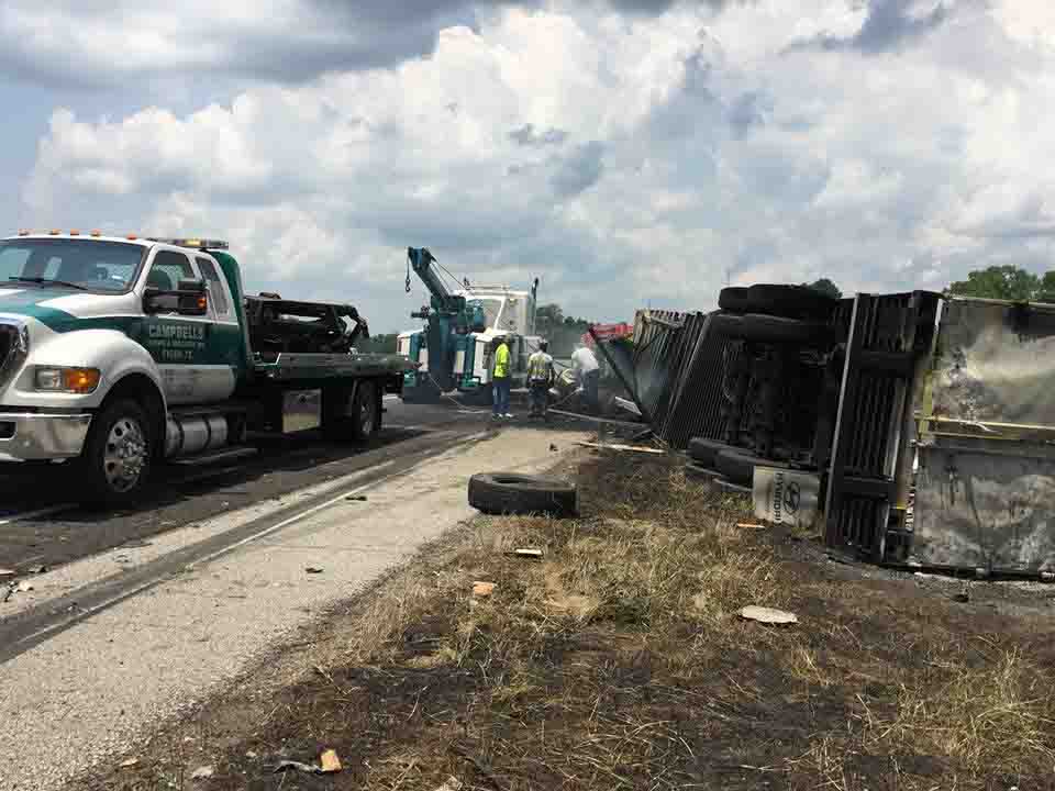 Heavy-duty tow truck at semi accident