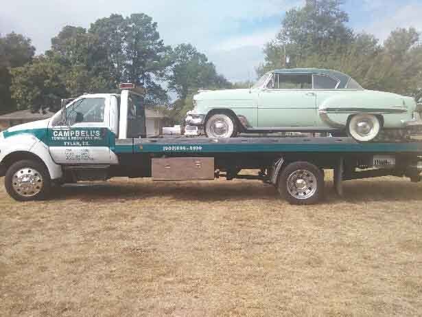 Vintage car on flatbed truck