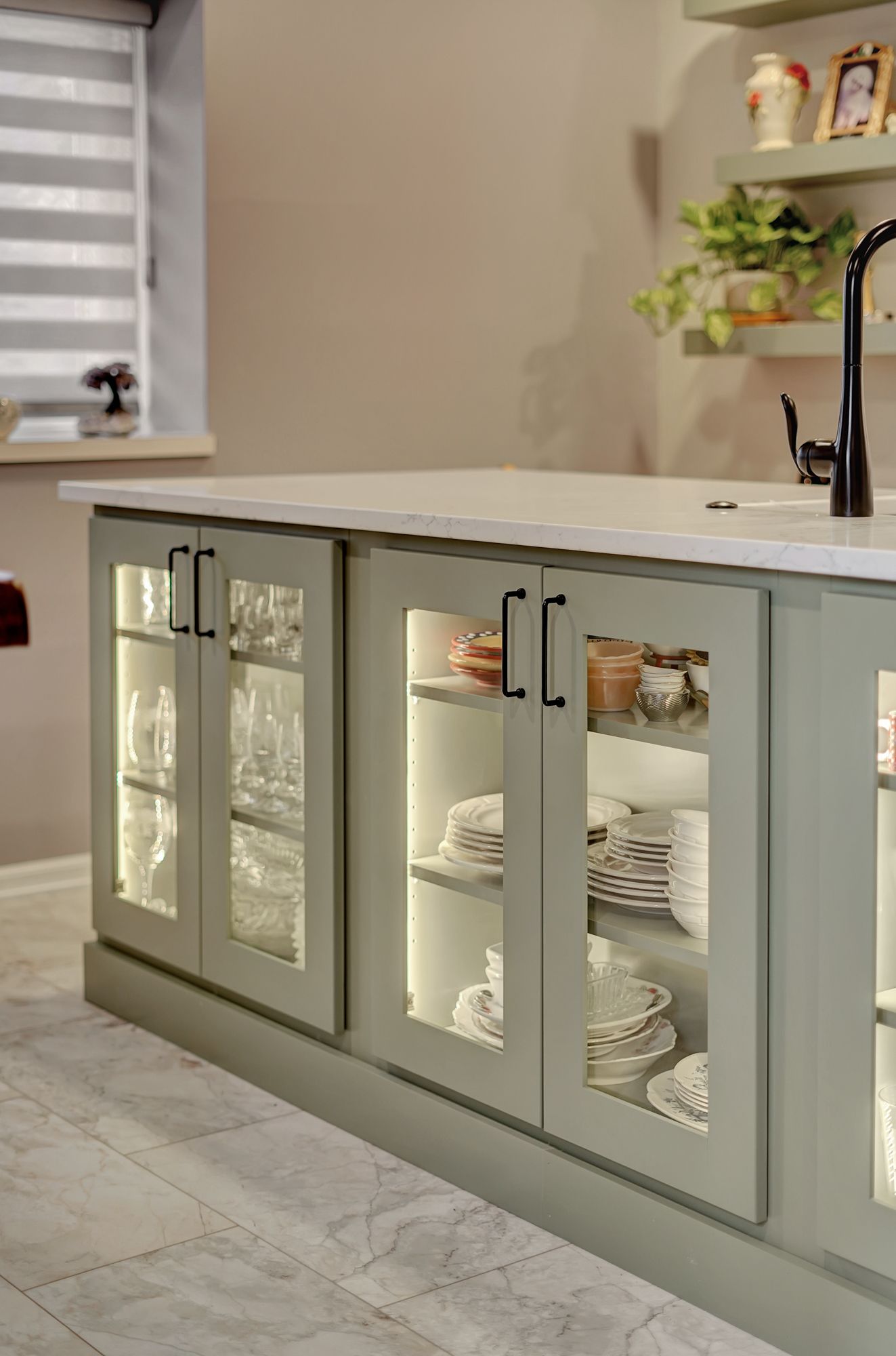 A kitchen with a sink , cabinets , shelves and a window | Lincoln, NE | SkyLimit Remodeling