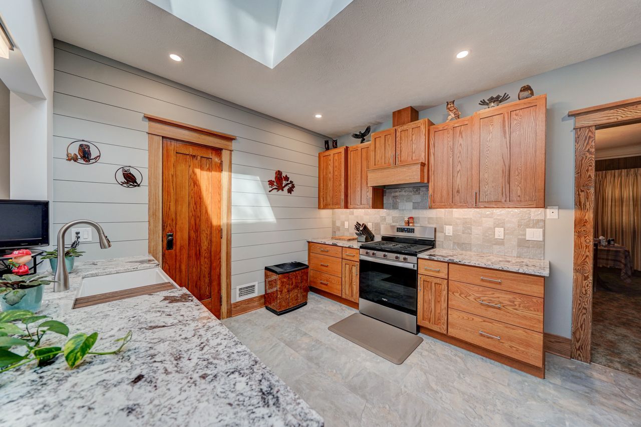 Remodeled Kitchen with Wood Cabinetry - Lincoln, NE - Skylimit Remodeling