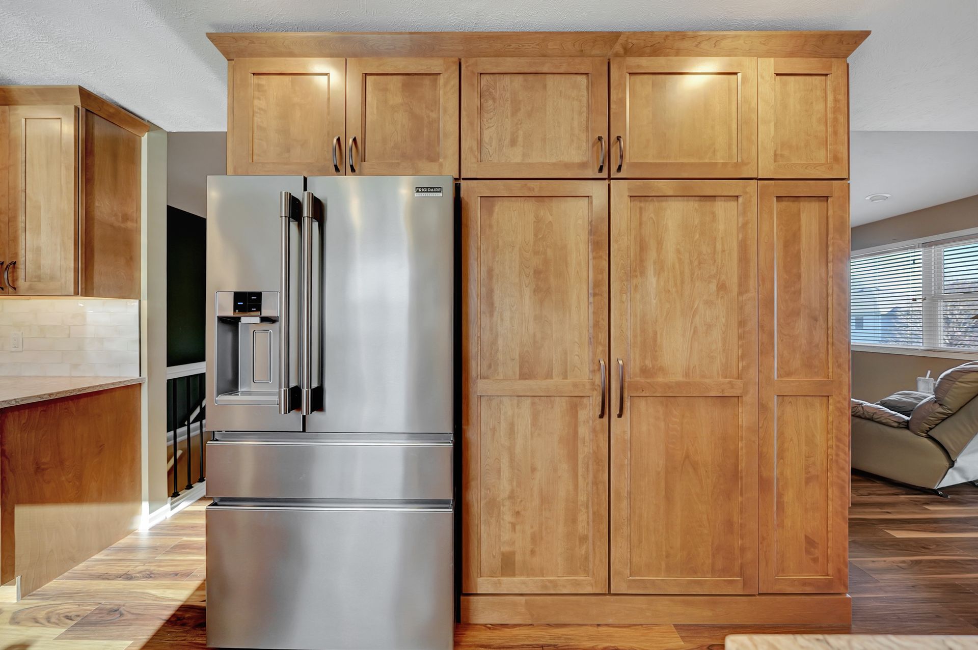 Wooden Cabinets And A Refrigerator - Lincoln, NE - SkyLimit Remodeling