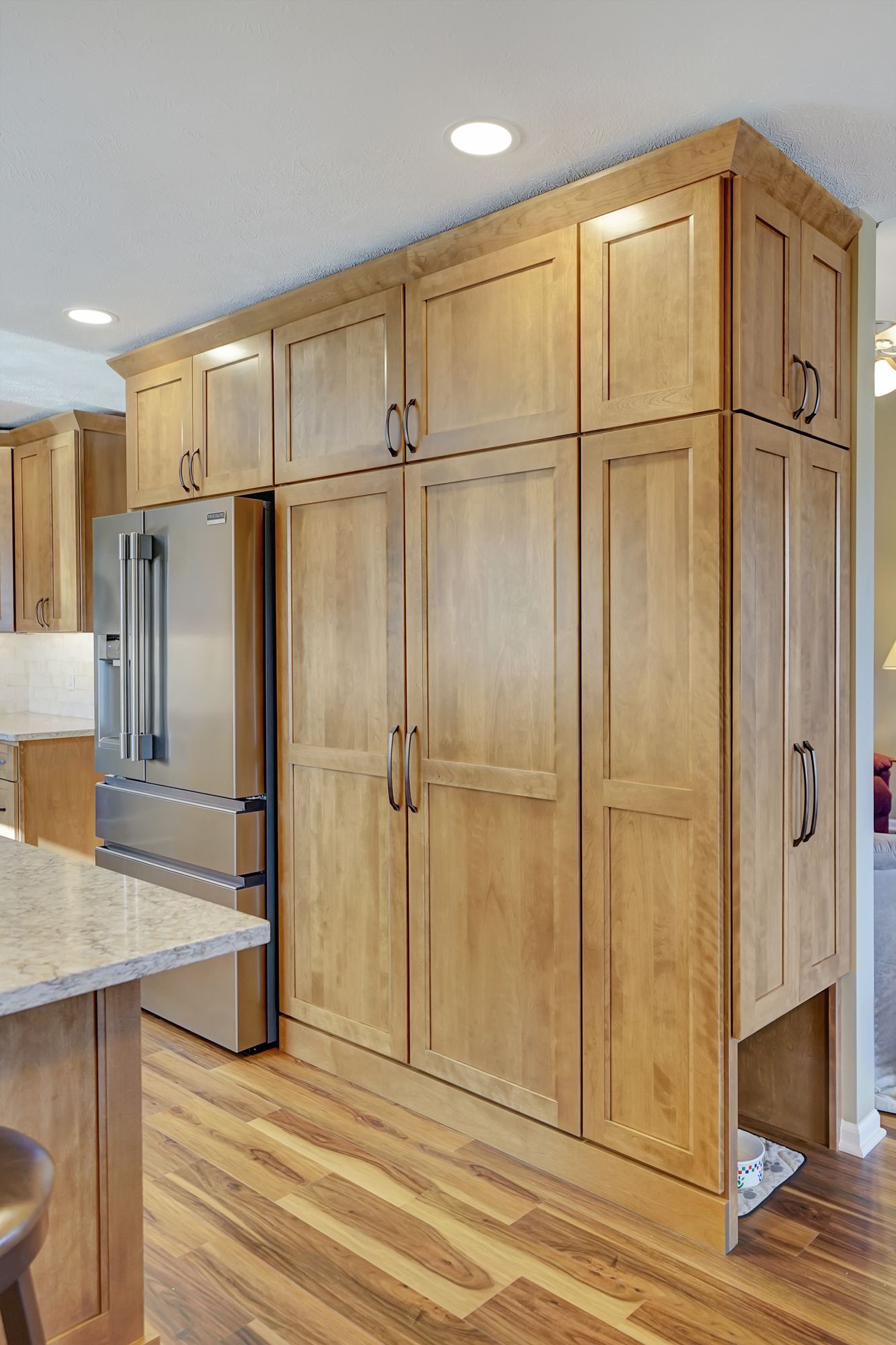 Wooden Cabinets And Stainless Steel Refrigerator - Lincoln, NE - SkyLimit Remodeling