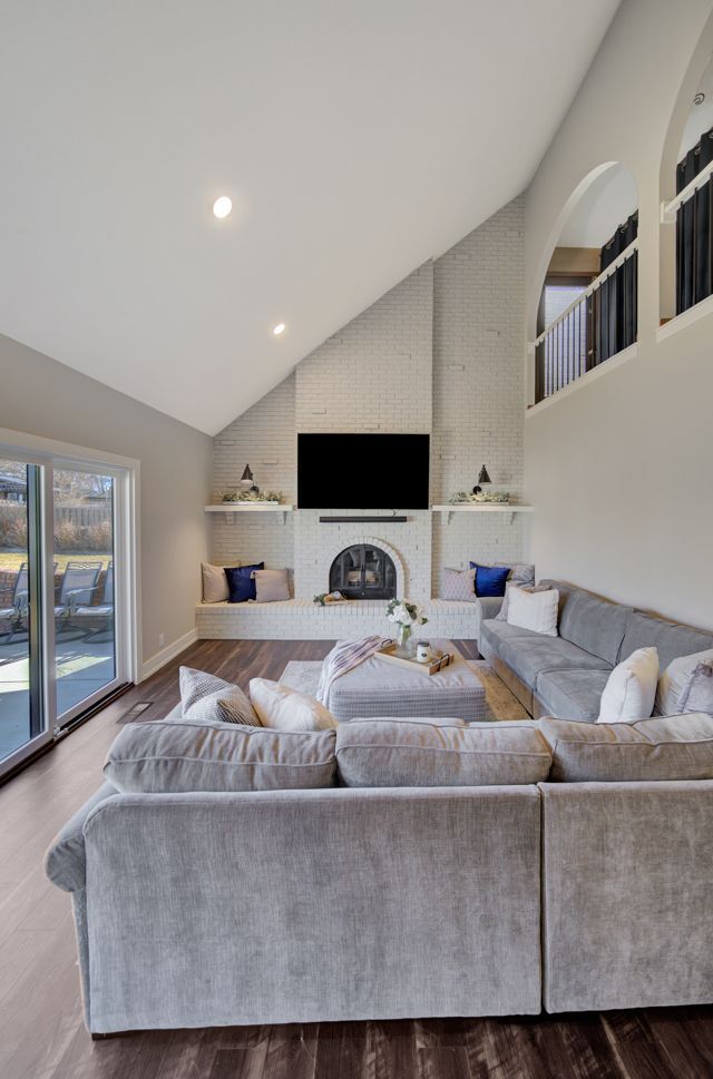 Zoomed out living room with TV - Lincoln, NE - SkyLimit Remodeling