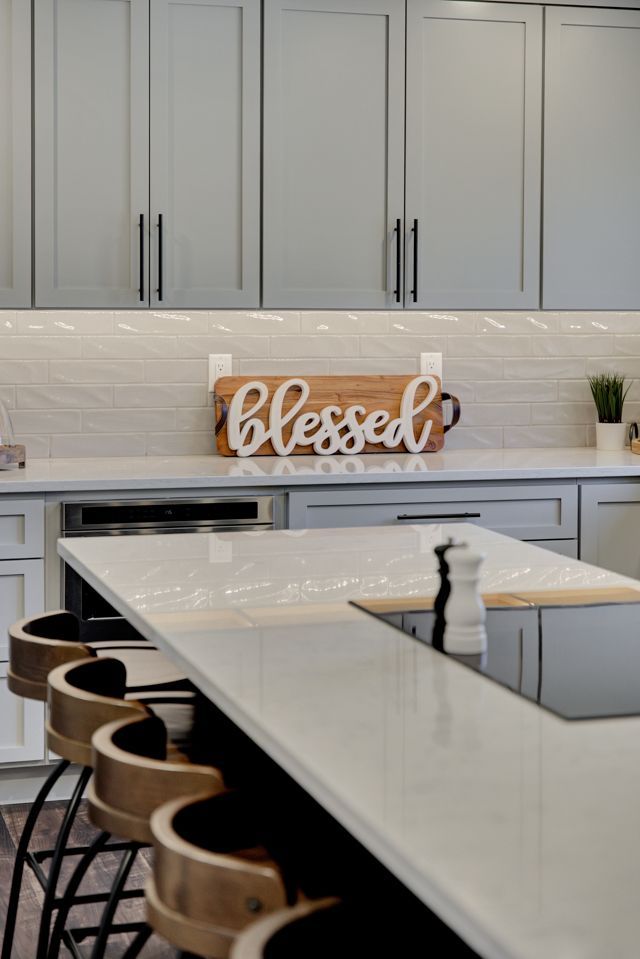 Right side view of kitchen with a blessed sign - Lincoln, NE - SkyLimit Remodeling