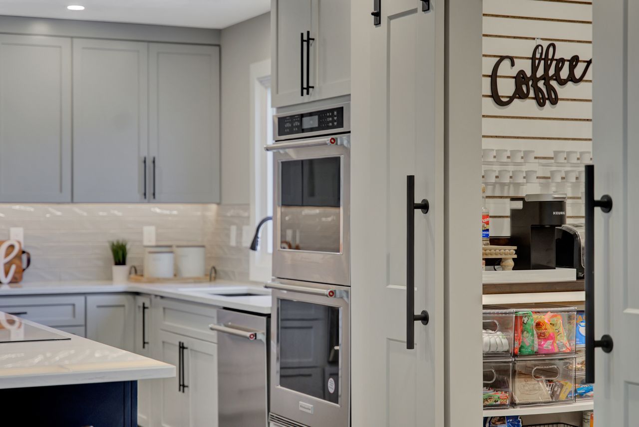 Kitchen with a coffee sign - Lincoln, NE - SkyLimit Remodeling