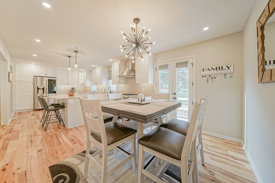 Kitchen with wood cabinets and marble counters