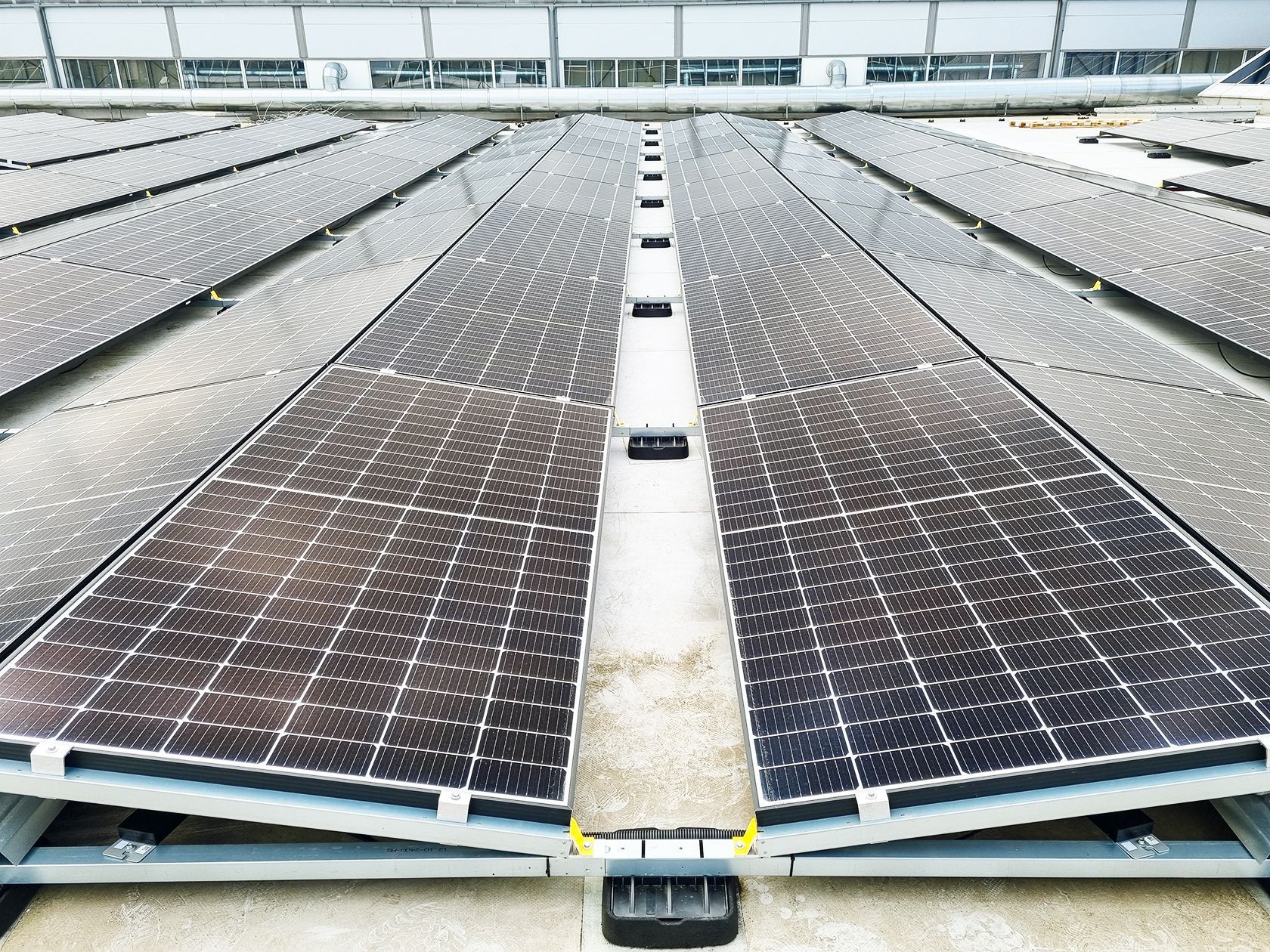 A roof with a lot of solar panels on it