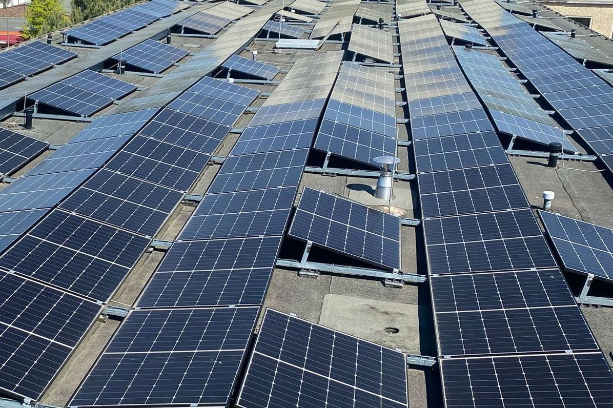 A roof with a lot of solar panels on it