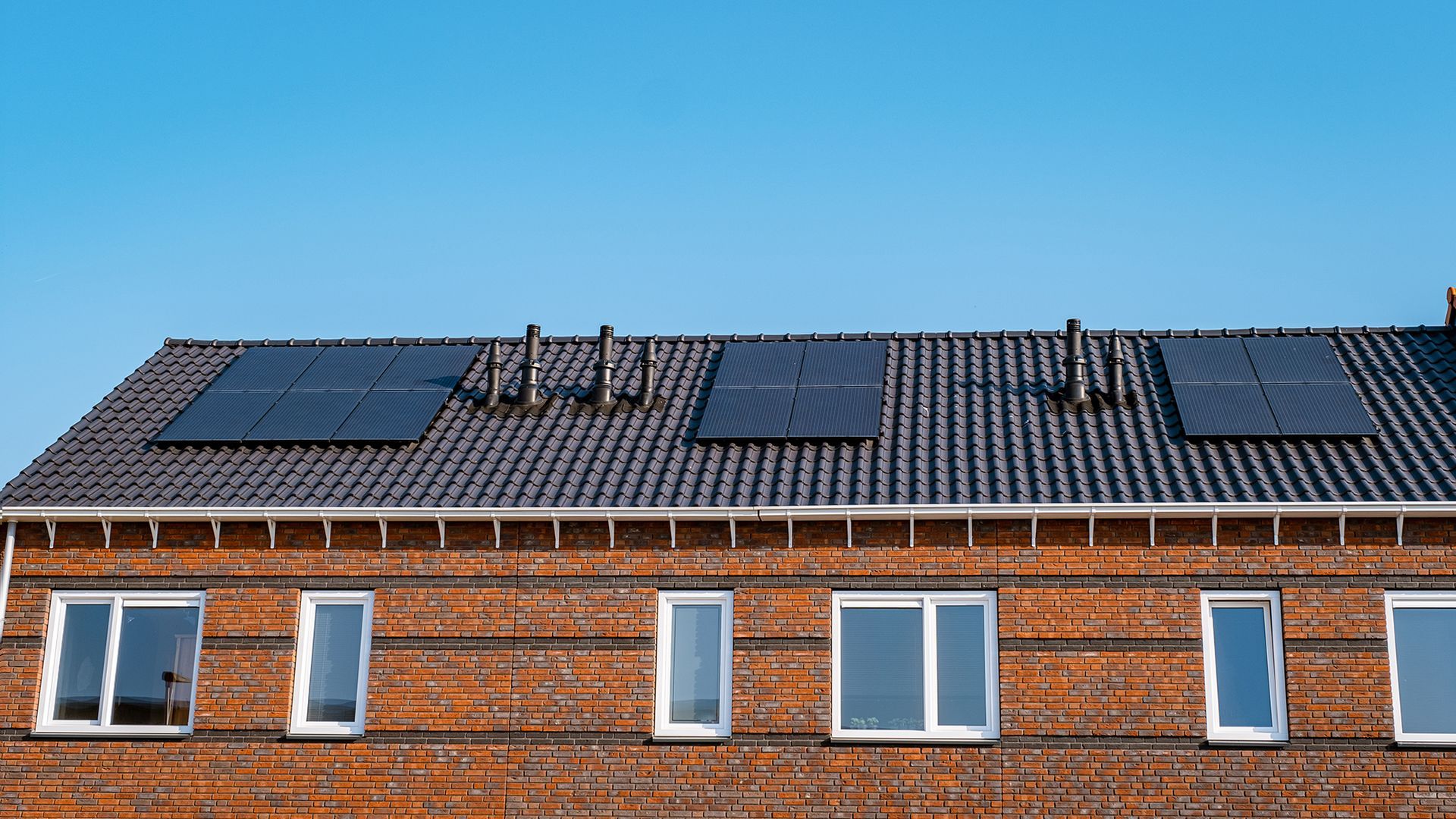 A roof with a lot of solar panels on it