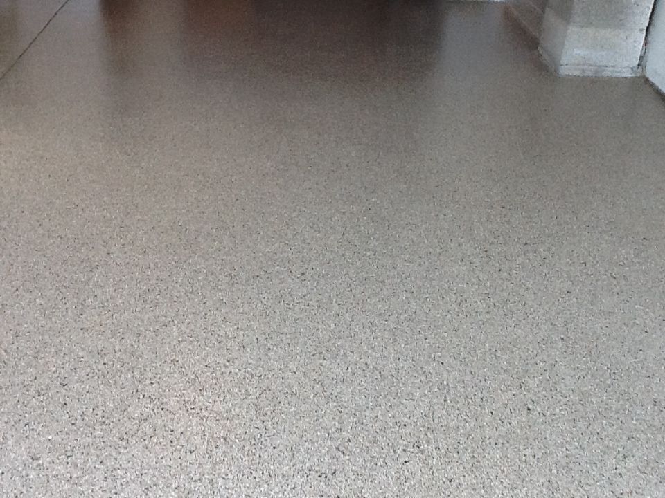 A close up of a concrete floor in a room.