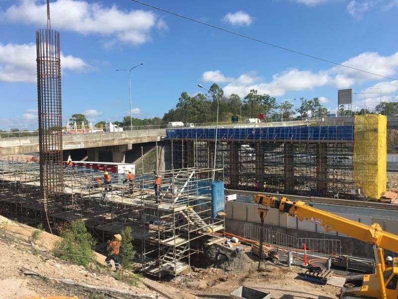 Constructing a Bridge: Lifting Steel Poles at the Construction Site — Bampak In Coolum Beach QLD