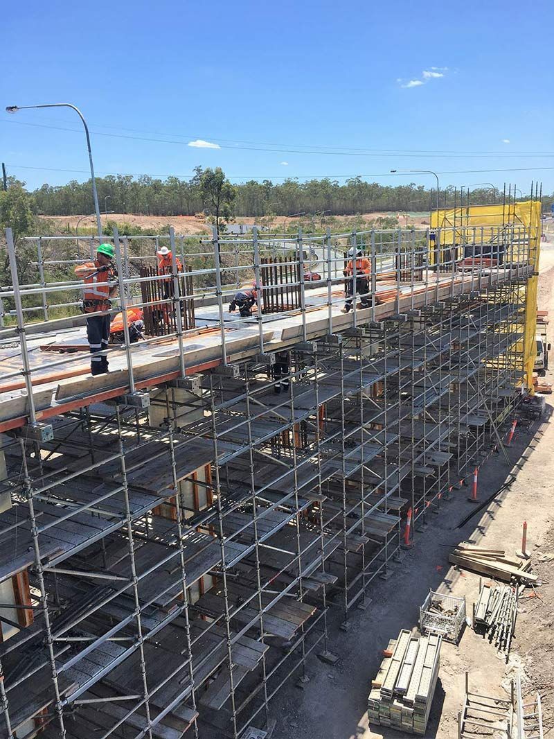 Scaffolding Connection at Construction Bridge by Skilled Workers — Bampak In Coolum Beach QLD