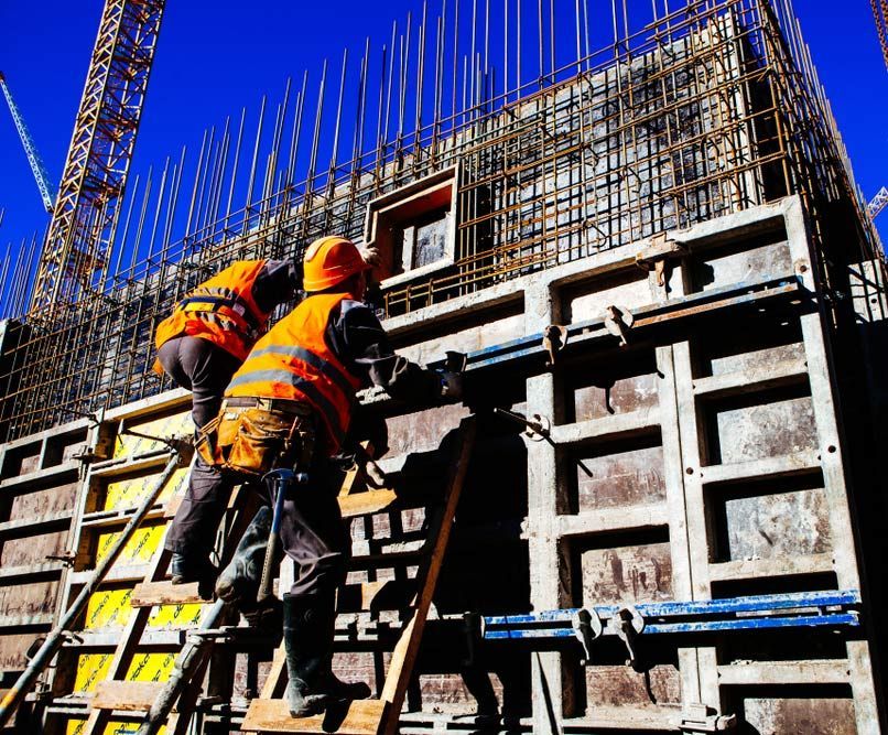 Construction Site With Two Labourers Engaged in Work — Bampak In Coolum Beach QLD