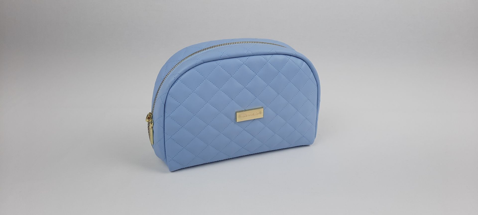 NECESSAIRE REDONDO PELE SINTÉTICA ACOLCHOADA COR AZUL ACESSÓRIOS DOURADOS