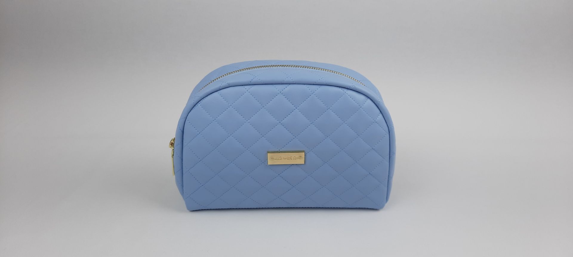 NECESSAIRE REDONDO PELE SINTÉTICA ACOLCHOADA COR AZUL ACESSÓRIOS DOURADOS