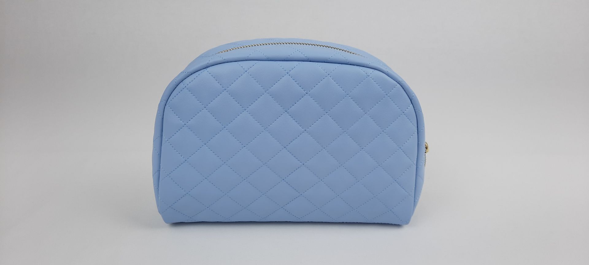 NECESSAIRE REDONDO PELE SINTÉTICA ACOLCHOADA COR AZUL ACESSÓRIOS DOURADOS