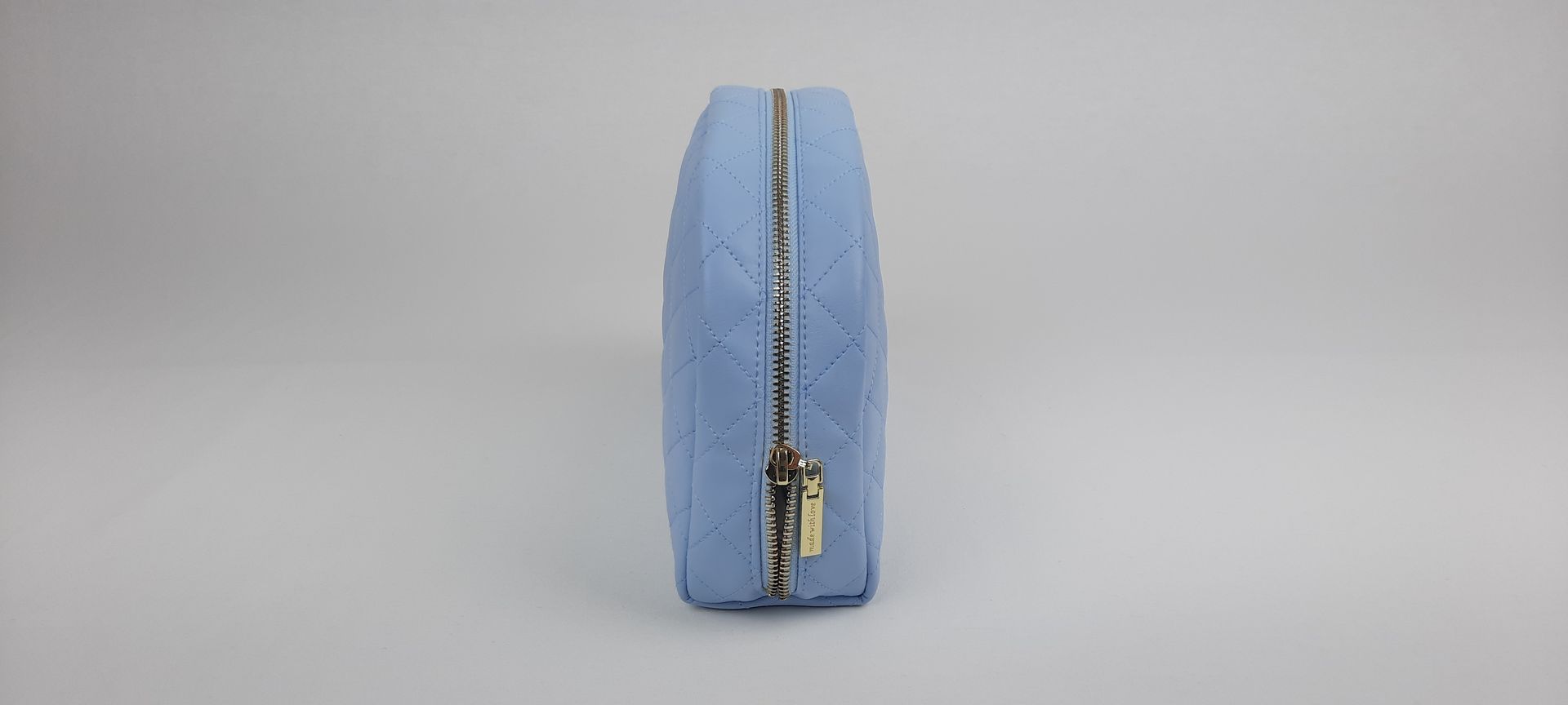 NECESSAIRE REDONDO PELE SINTÉTICA ACOLCHOADA COR AZUL ACESSÓRIOS DOURADOS
