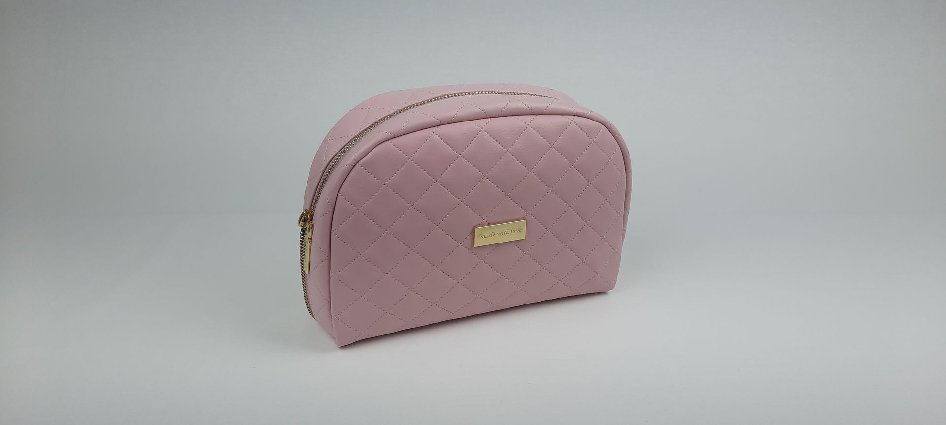 NECESSAIRE REDONDO PELE SINTÉTICA ACOLCHOADA COR ROSA ACESSÓRIOS DOURADOS