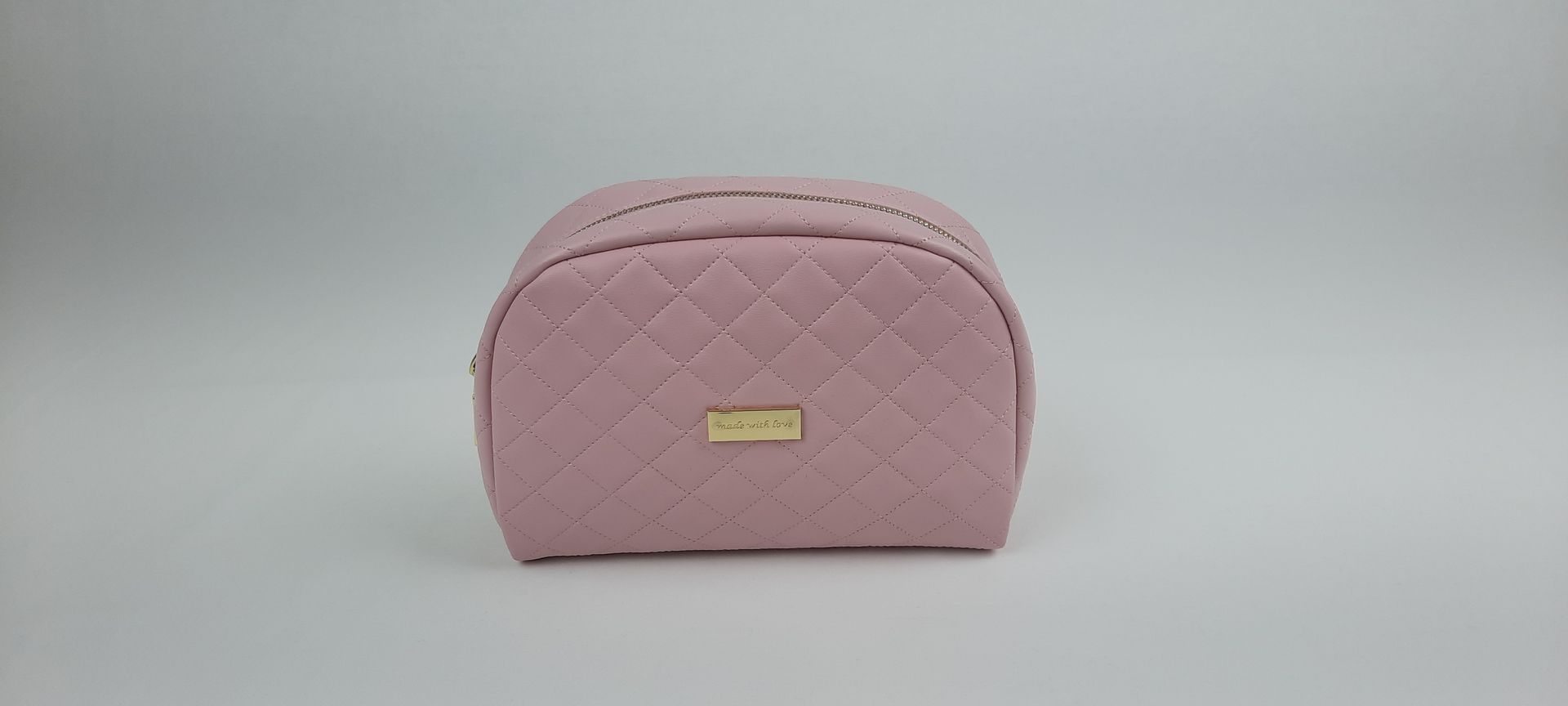 NECESSAIRE REDONDO PELE SINTÉTICA ACOLCHOADA COR ROSA ACESSÓRIOS DOURADOS