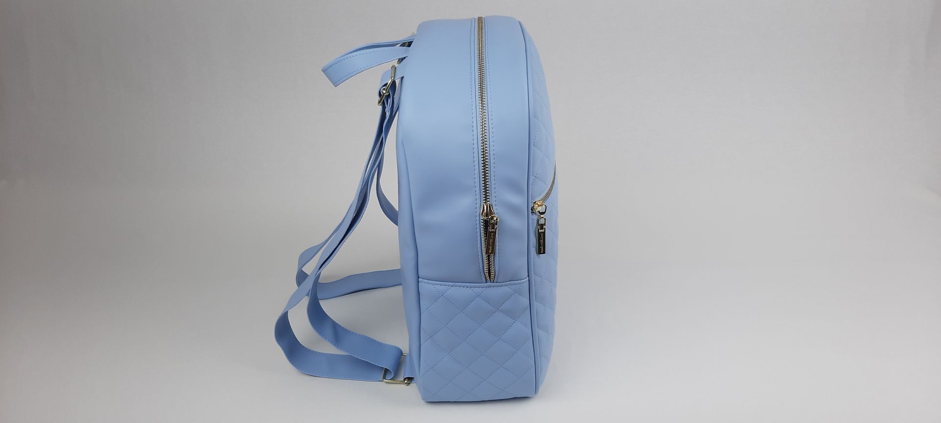 MOCHILA PELE SINTÉTICA ACOLCHOADA COR AZUL ACESSÓRIOS DOURADOS