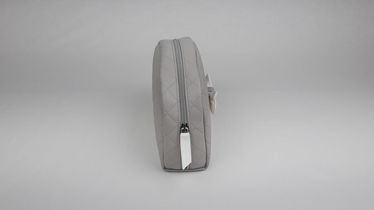 NECESSAIRE REDONDO LAÇO PELE SINTÉTICA ACOLCHOADA COR CINZA