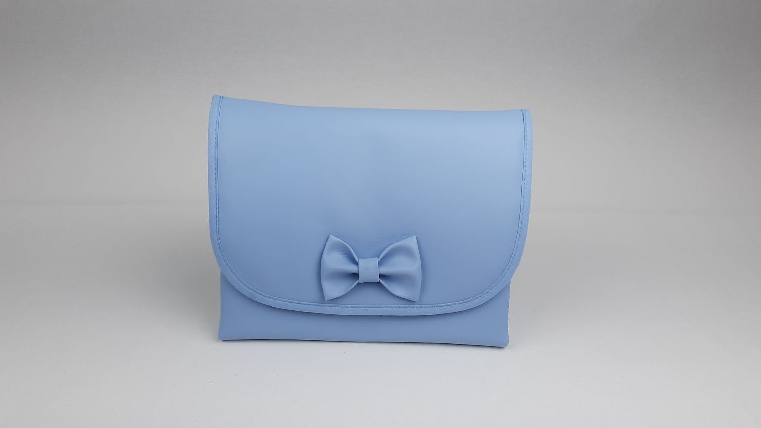 MUDA FRALDAS PELE SINTÉTICA LISA COM LAÇO COR AZUL