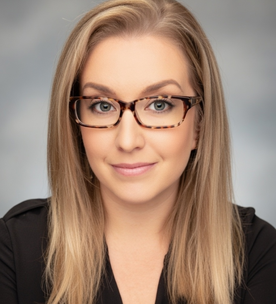 Solid, light beige background.