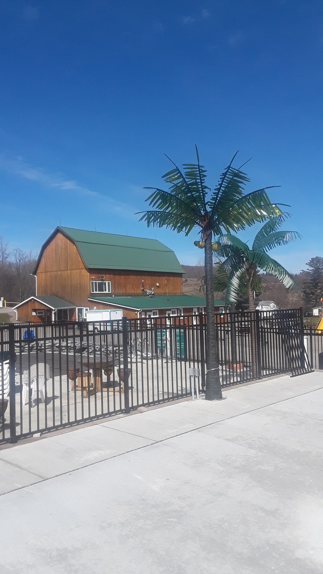 Wrought iron and aluminum fence installation  in Delavan, NY by KKR Fencing