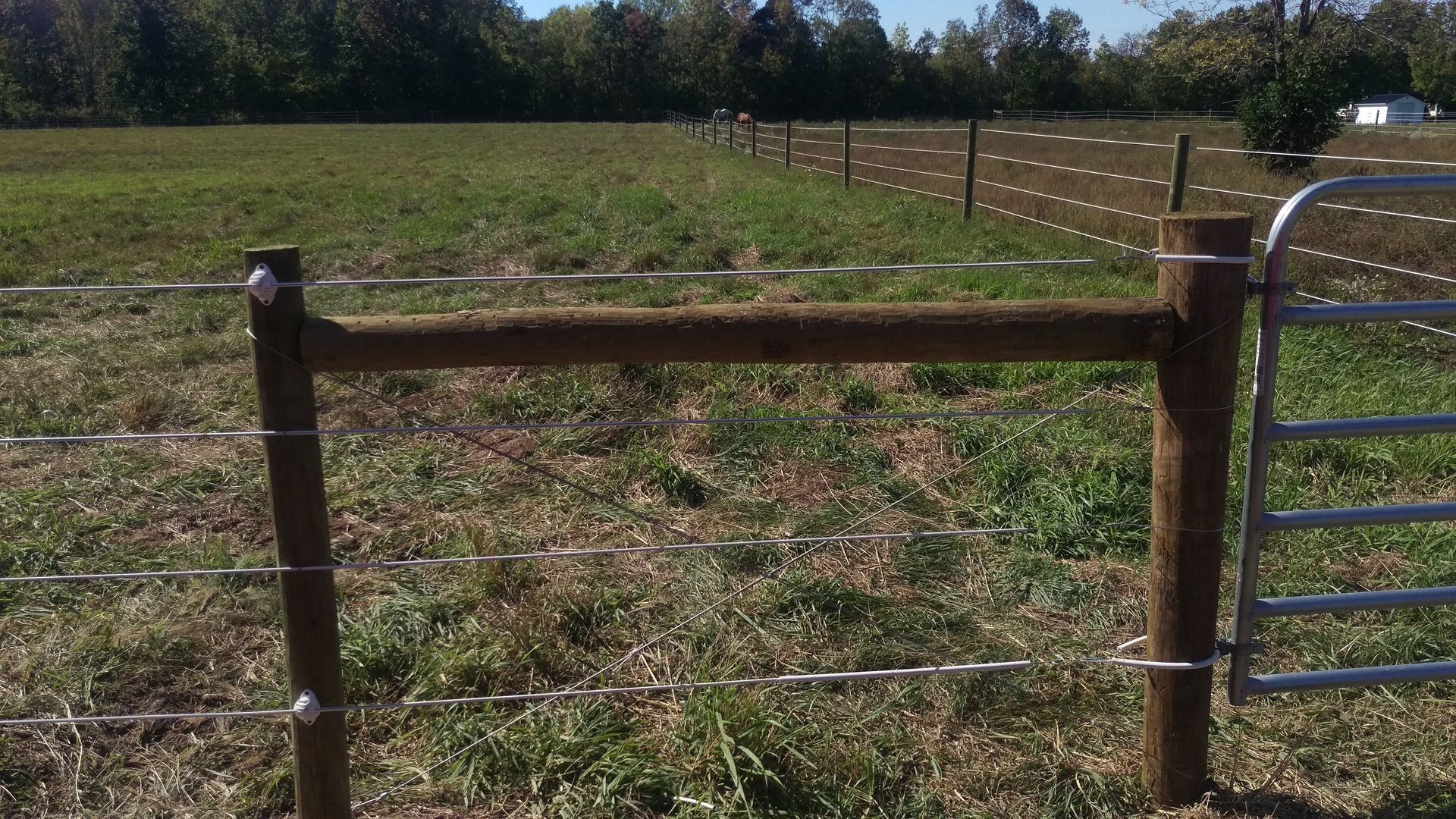 Chain link fence installation in Delavan, NY by KKR Fencing