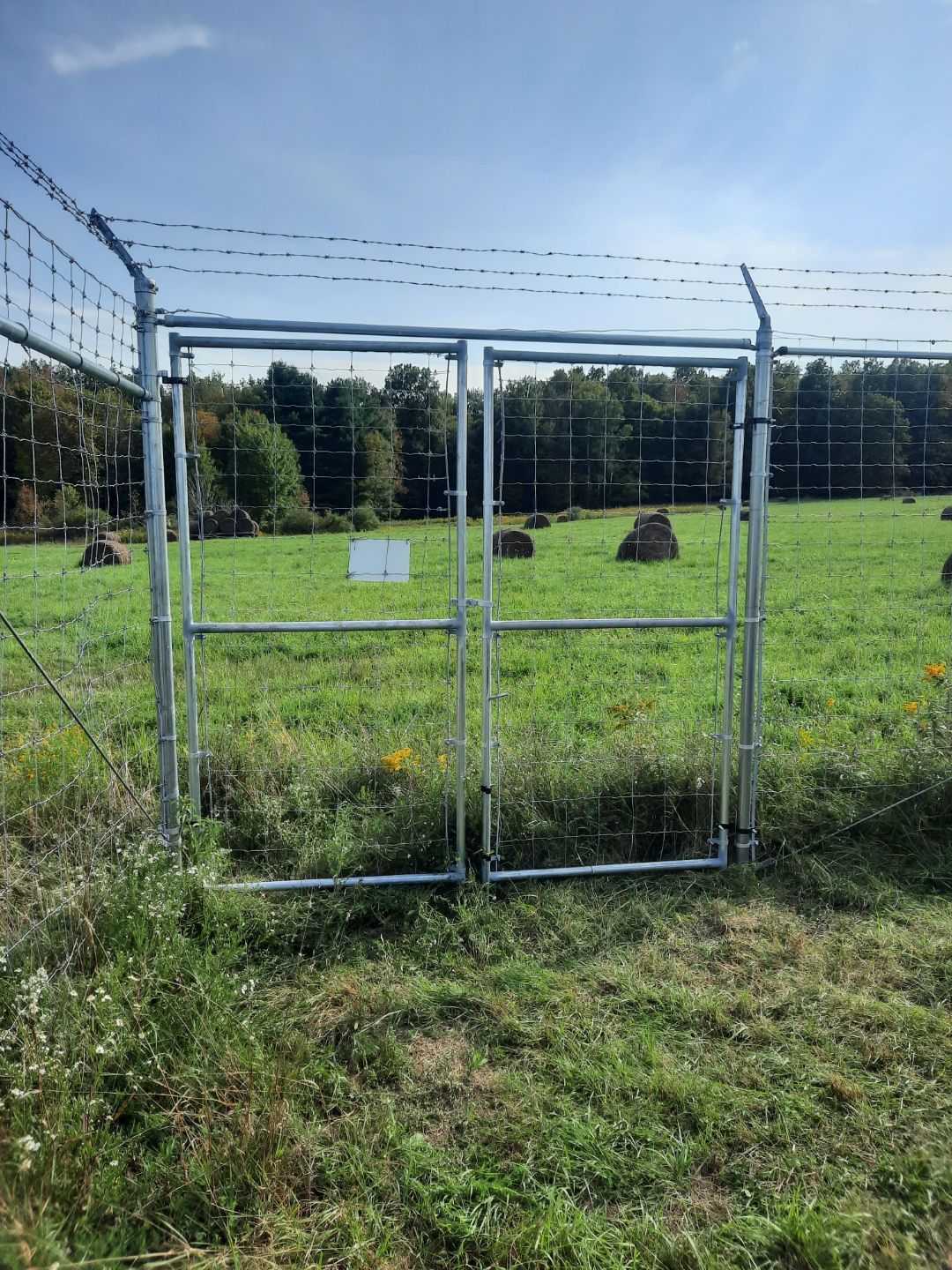 Chain link fence installation in Delavan, NY by KKR Fencing
