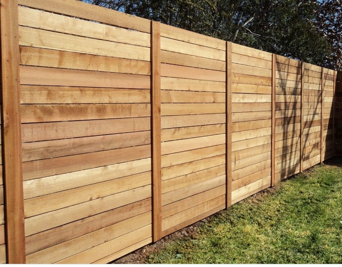 Wood fence installation in Delavan, NY by KKR Fencing