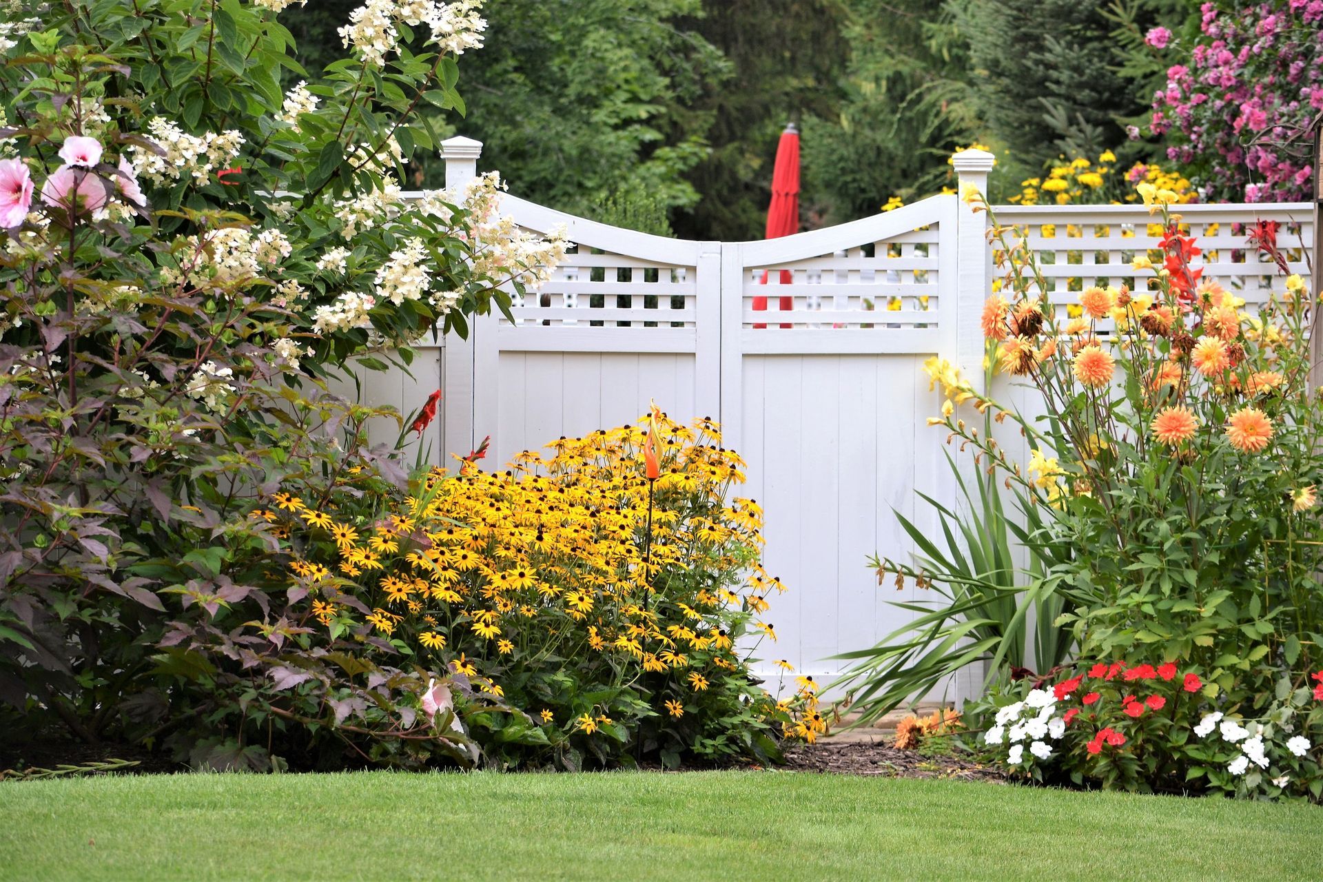 white vinyl fence being installed