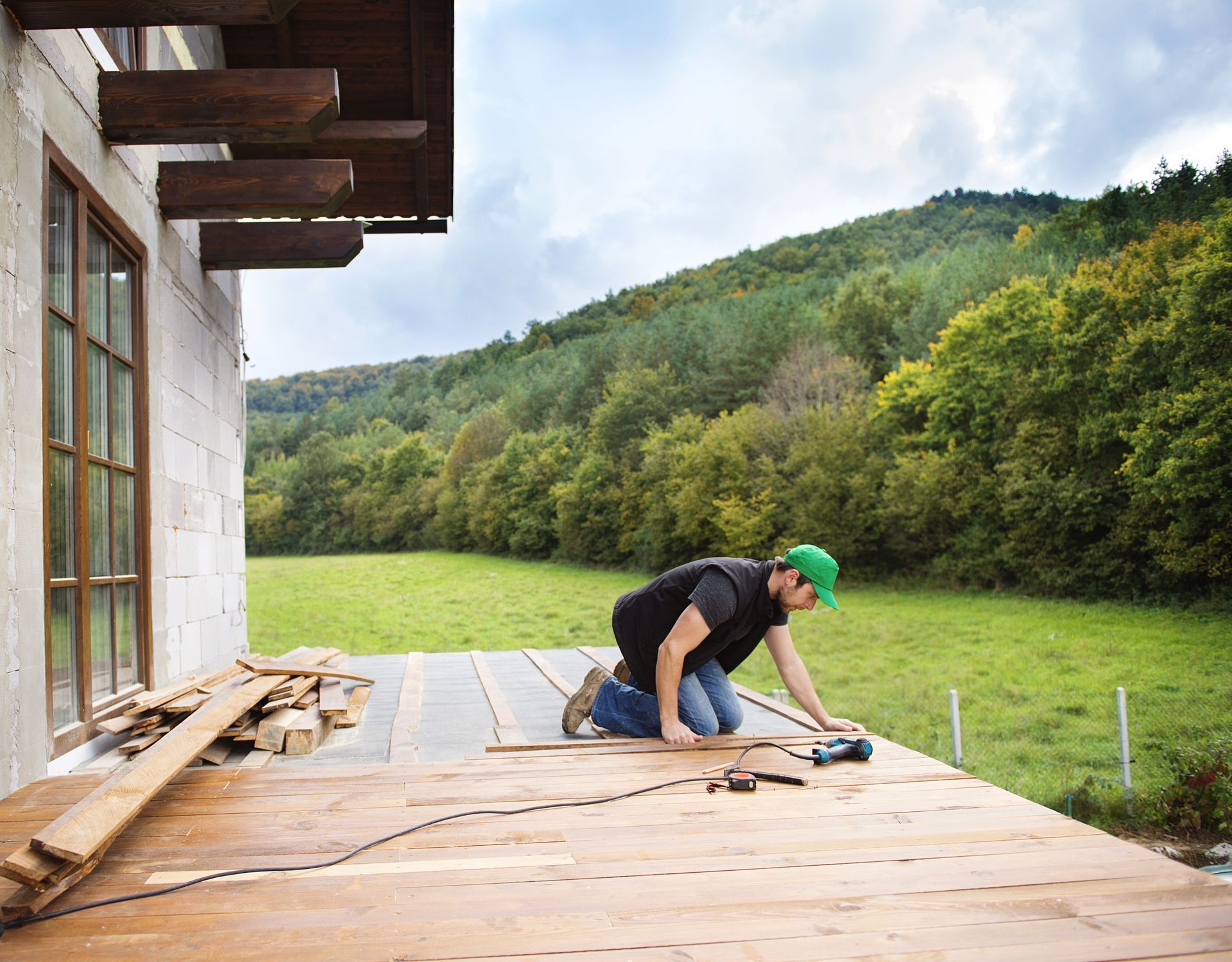 KKR worker building deck on a nice day in western NY