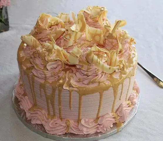 custom pink and gold cake