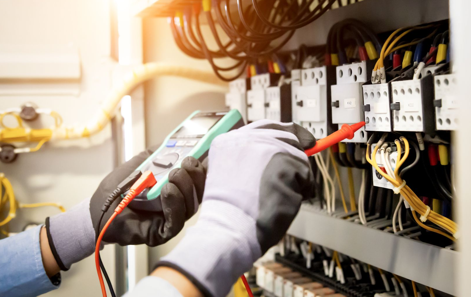 Electrical Installation Services — Electrician Installing New Outlet in Sumner, WA