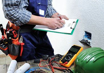 Electrical Installation Services — Electrician Installing New Outlet in Sumner, WA