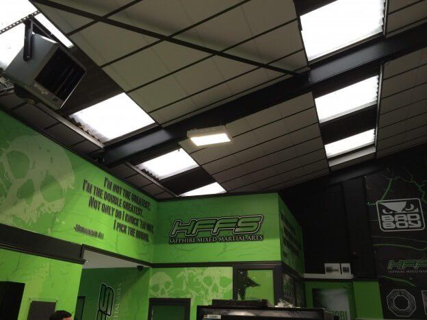 a ceiling with a sign that says bees on it