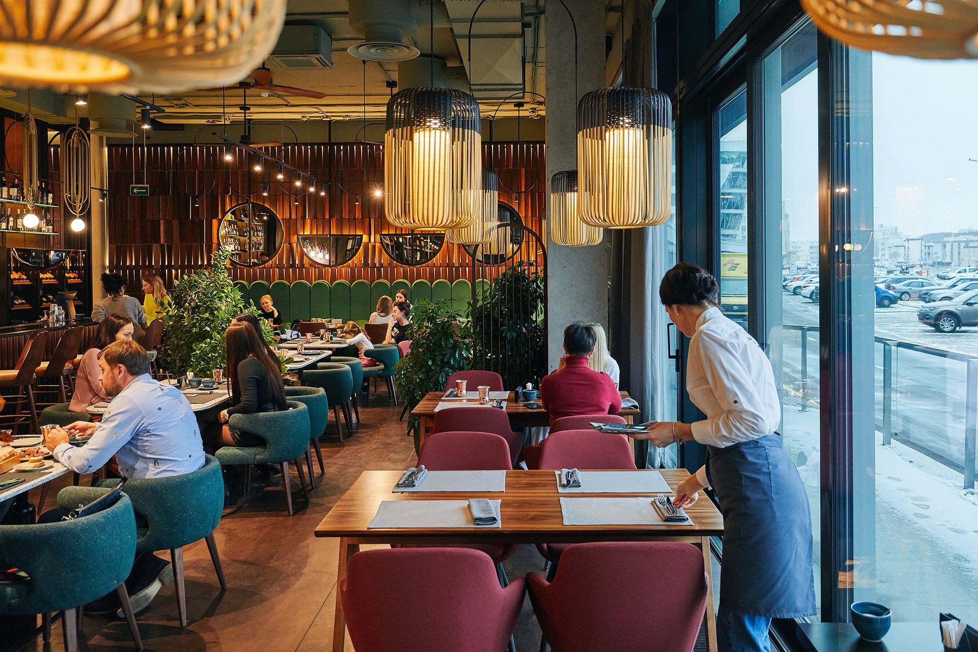 Restaurant with guests and staff