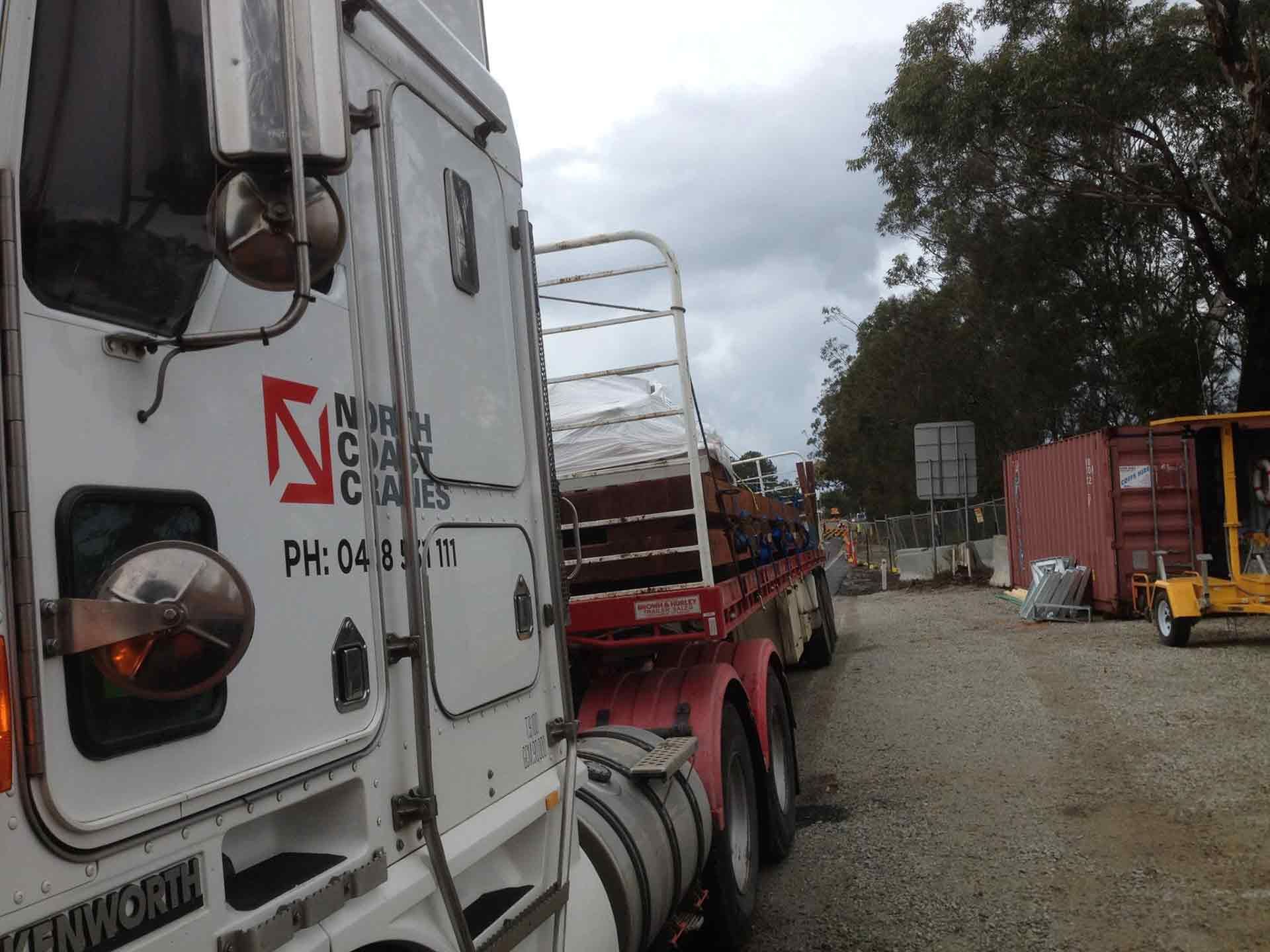 A Kenworth Truck Is Parked In A Parking Lot — North Coast Cranes In Armidale, NSW