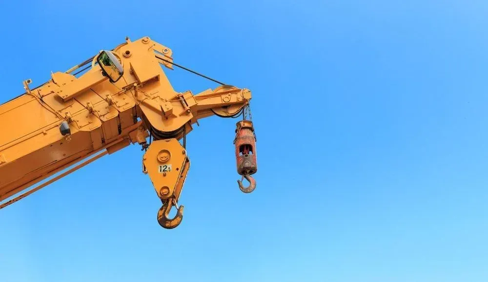 A Close up Of a Crane Hook Against a Blue Sky — North Coast Cranes In Macksville, NSW