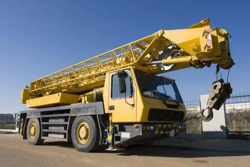 A Yellow Truck with A Crane Attached to It — North Coast Cranes In Grafton, NSW